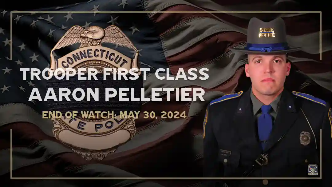 An image shows a state police officer in uniform. To the left, text reads, "Trooper First Class Aaron Pelletier, End of Watch May 30, 2024," over an American flag background with a police badge. This somber moment was captured just before the press conference about the auto draft legislation.