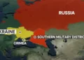 Map showing parts of Eastern Europe and Western Asia with Ukraine in yellow, Crimea in grey, and Russia in red highlighting the Southern Military District amid the ongoing Ukraine conflict.