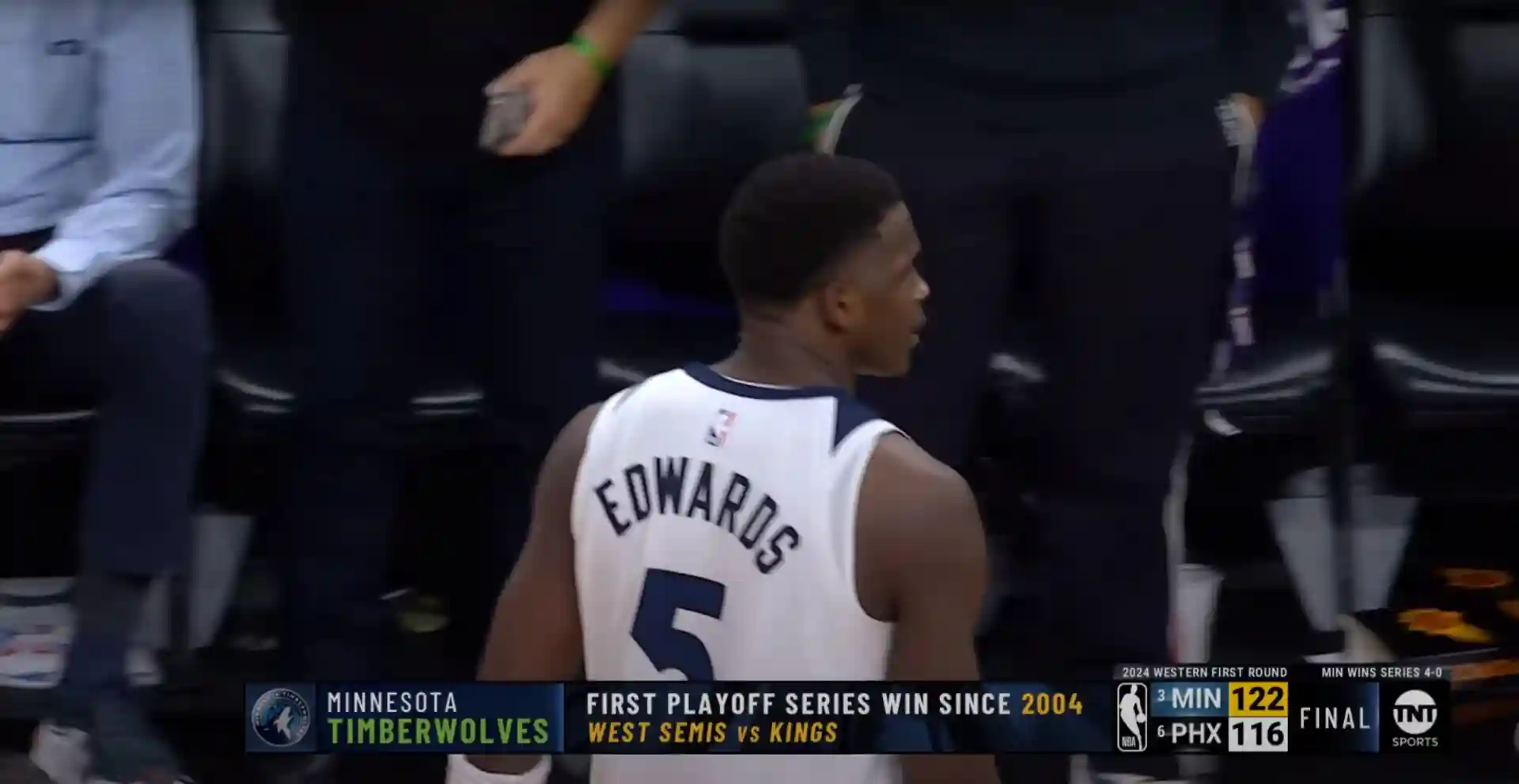 Minnesota Timberwolves player wearing jersey number 5 with "Edwards" on the back, walking on the court. Text overlay indicates the team's first playoff series win since 2004 against the Kings. Catch all the basketball highlights from this thrilling NBA 2024 season as Timberwolves vs Suns matchups take center stage.