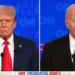 Two men are standing at podiums with microphones, facing forward, during a CNN 2024 presidential debate. The background features the CNN logo repeatedly, setting the stage for Biden vs Trump as they share debate highlights.