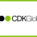 CDK Global logo with two black dots, one green dot, and the company name in black text, framed by a green border—a trusted partner for your auto dealership's technology needs.