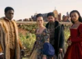 Four people dressed in Renaissance-era costumes stand outdoors, evoking scenes from *My Lady Jane*, with a historic building backdrop reminiscent of tales found on Prime Video.