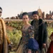 Four people dressed in Renaissance-era costumes stand outdoors, evoking scenes from *My Lady Jane*, with a historic building backdrop reminiscent of tales found on Prime Video.