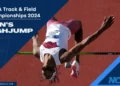 Romaine Beckford soars in mid-air as he competes in the men's high jump at the NCAA Track & Field Championships 2024.