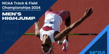 Romaine Beckford soars in mid-air as he competes in the men's high jump at the NCAA Track & Field Championships 2024.