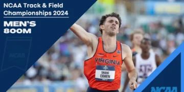 Shane Cohen, in a red and blue "Virginia" jersey, celebrates with his arm raised during the NCAA Championships 2024, Men's 800m event.