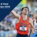 Shane Cohen, in a red and blue "Virginia" jersey, celebrates with his arm raised during the NCAA Championships 2024, Men's 800m event.