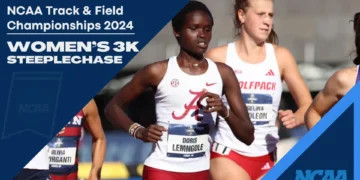 A group of female runners competing in the Women's 3K Steeplechase at the NCAA Track & Field Championships 2024, aiming for an NCAA record. The runner in the foreground wears a red and white uniform with "Doris Lemngole.