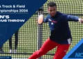 An athlete in a blue shirt and red pants readies to throw a discus in a netted area. Text reads, "NCAA Track & Field Championships 2024 Men's Discus Throw." Francois Prinsloo prepares to compete.