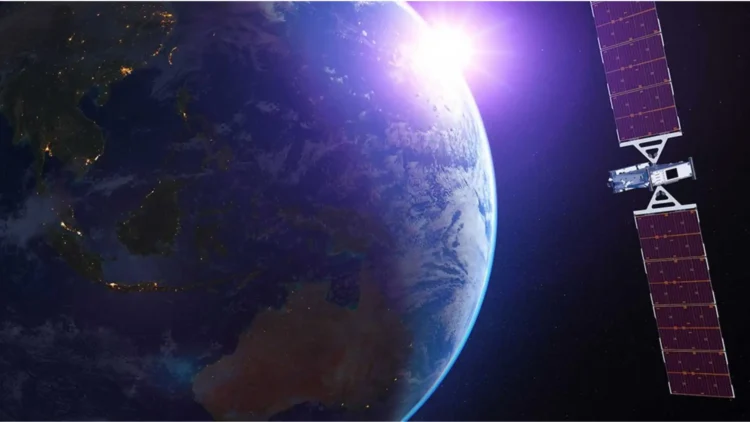 A satellite, part of the Luxembourg-based SES O3b mPOWER network, orbits near Earth with the sun's rays illuminating both the planet and the satellite, casting a vibrant glow on the image.