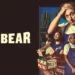 The promotional image for "The Bear" Season 3 showcases a group of people in work attire, some holding kitchen utensils, set against a cityscape background, with Carmy at the forefront. This season promises to delve deeper into their journey toward achieving Michelin Star excellence.