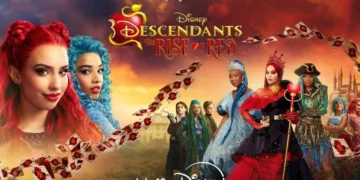 Promotional image for Disney Channel's "Descendants: The Rise of Red" featuring character portraits in colorful costumes against a dramatic sky backdrop. Catch the premiere on July 12 on Disney+. Don't miss the magic of Descendants 2024!