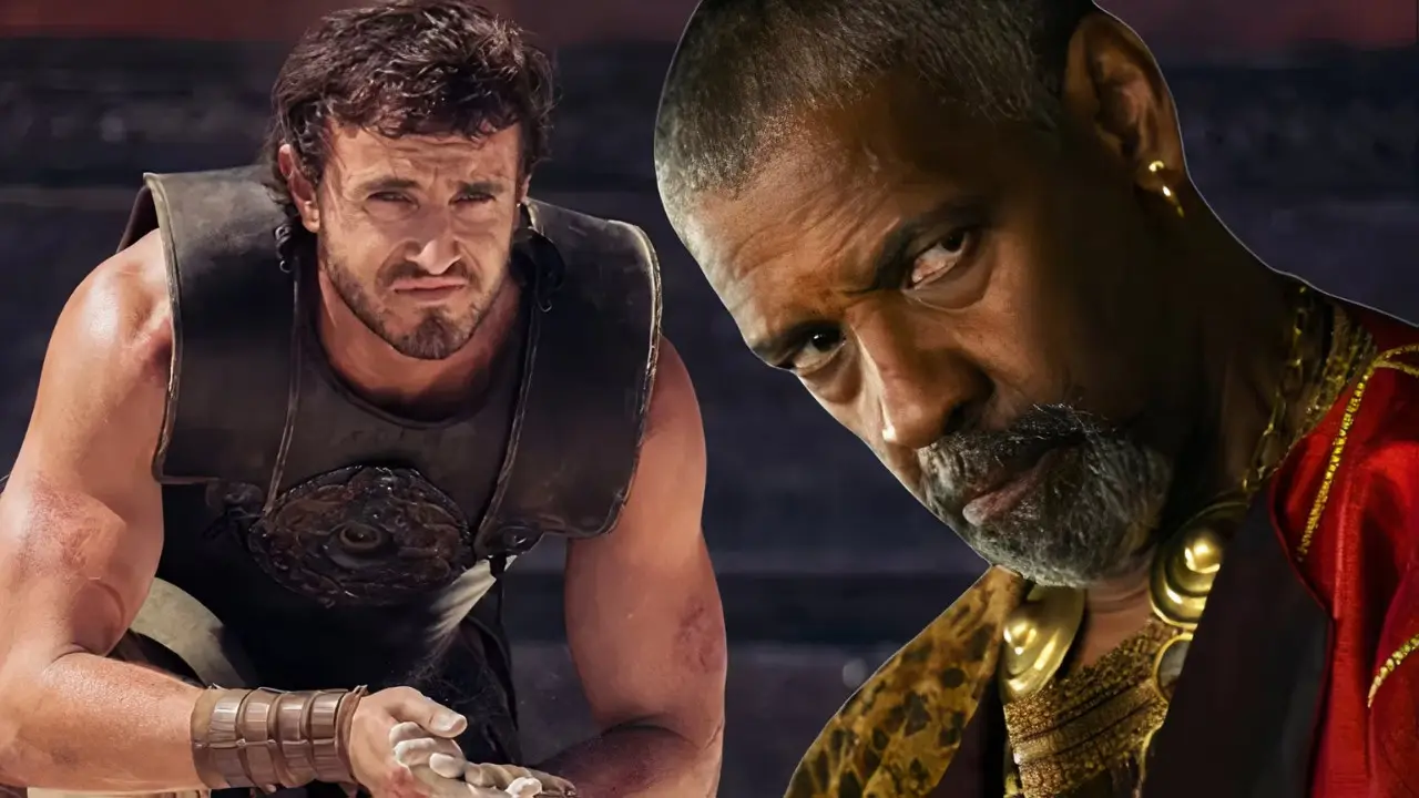 Two men are depicted. The man in the foreground has a serious expression, gray beard, and is wearing a patterned outfit. The man in the background, clad in armor, looks distressed and holds an object in his hands—a scene reminiscent of Gladiator II starring Paul Mescal.