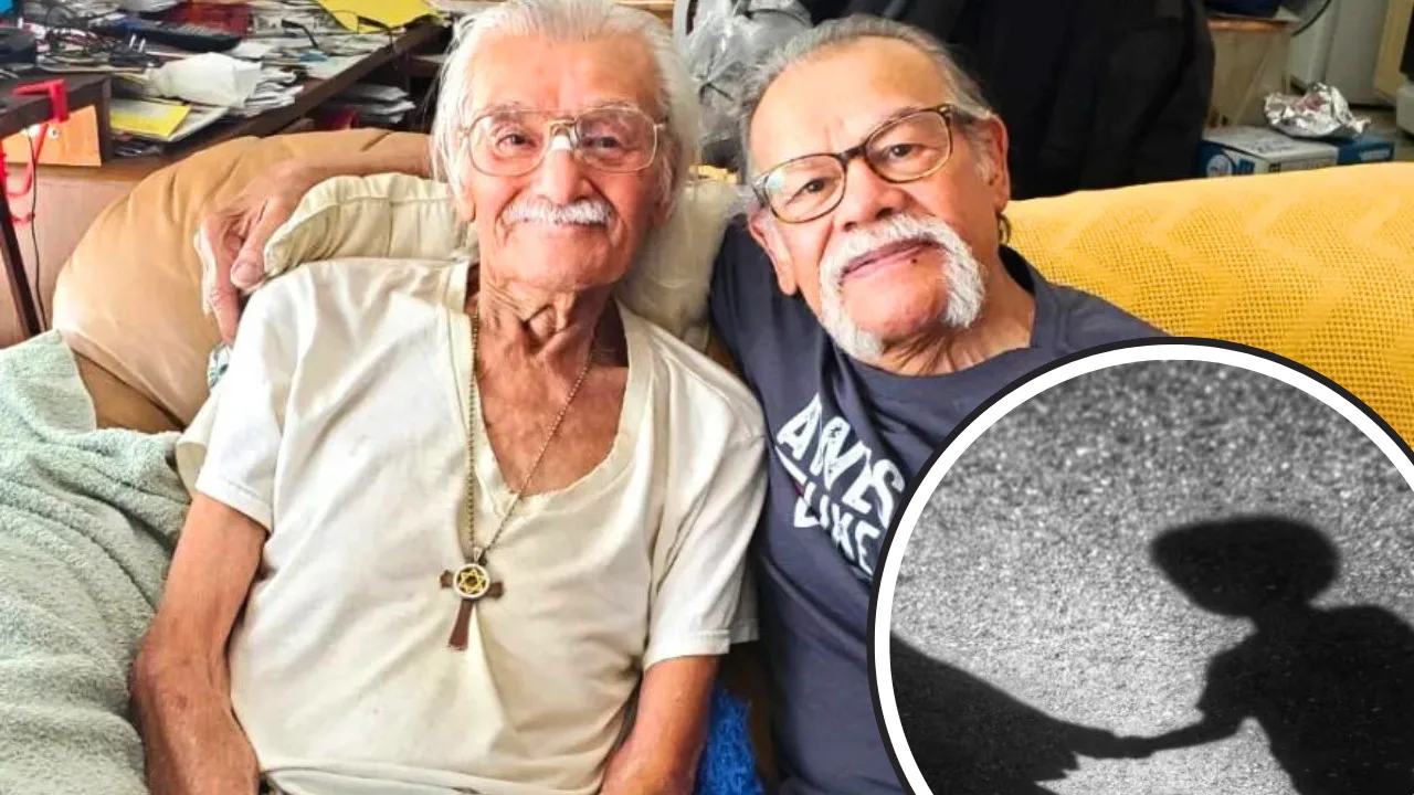 Two elderly men with gray hair and glasses sit closely on a couch. One wears a white T-shirt and cross necklace, the other a gray T-shirt. An inset photo shows a shadow of two people holding hands, symbolizing their heartwarming family reunion after decades apart.