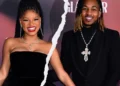 Two people smiling in formal attire with a ripped effect between them, reminiscent of Halle Bailey's captivating style.