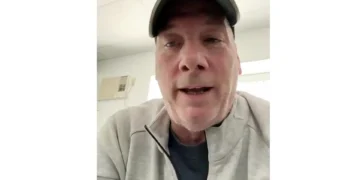 duane gray in a cap and gray jacket speaks indoors with a neutral expression, addressing the serious issue of clergy abuse in Connecticut.