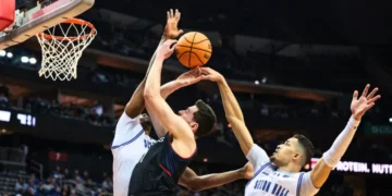 UConn Basketball Blows Late Lead, Falls to Seton Hall in OT Shocker, UConn basketball loss, UConn vs. Seton Hall, Big East basketball, UConn late-game struggles