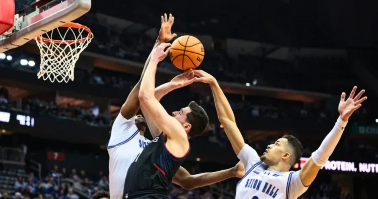 UConn Basketball Blows Late Lead, Falls to Seton Hall in OT Shocker, UConn basketball loss, UConn vs. Seton Hall, Big East basketball, UConn late-game struggles