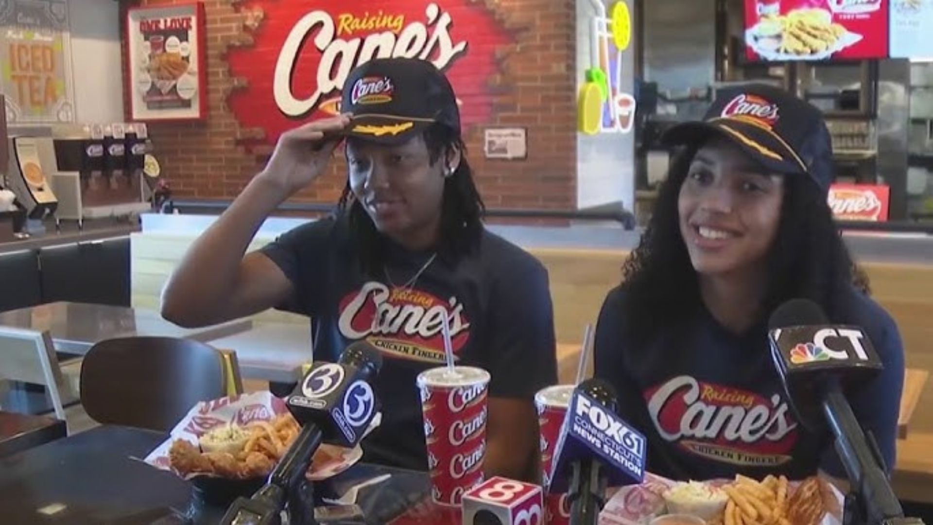 UConn basketball fans, Azzi Fudd KK Arnold, Raising Cane’s Enfield