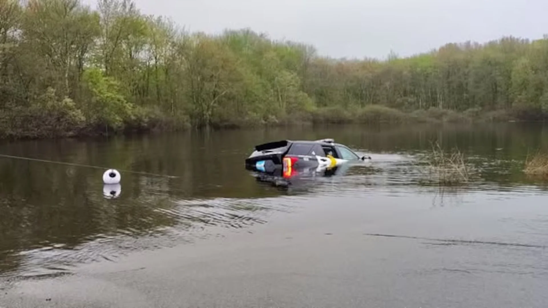 Wolcott police rescue, officer cruiser pond, cruiser submerged Wolcott CT, Spindle Hill Road incident, police officer water rescue