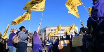 SEIU 1199NE members rally outside a long-term care facility in Hartford, Connecticut