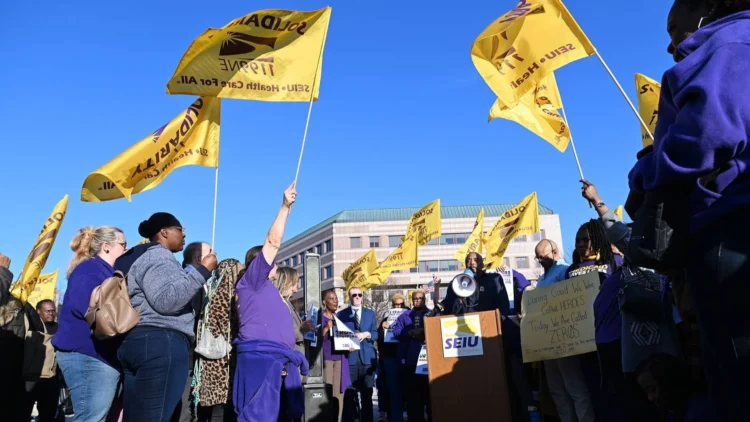 SEIU 1199NE members rally outside a long-term care facility in Hartford, Connecticut